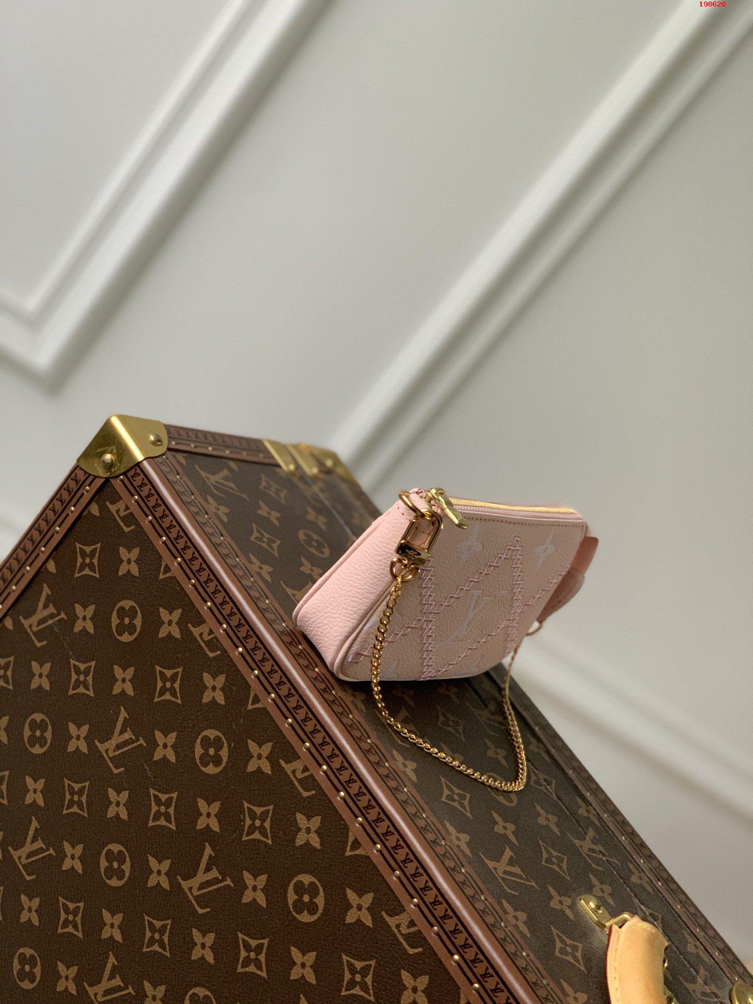 M81140 Louis Vuitton Monogram Empreinte Broderies Mini Pochette